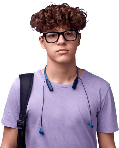 Teenager in a purple shirt with headphones around his neck with a serious look on his face